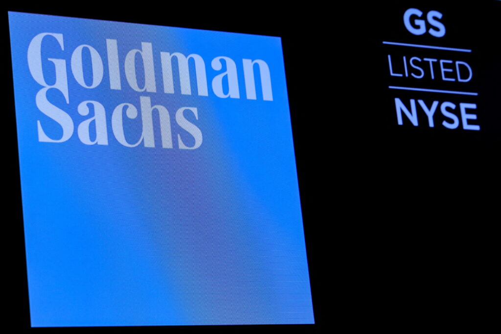 The ticker symbol and logo for Goldman Sachs is displayed on a screen on the floor at the New York Stock Exchange. Photo: Brendan McDermid, Reuters