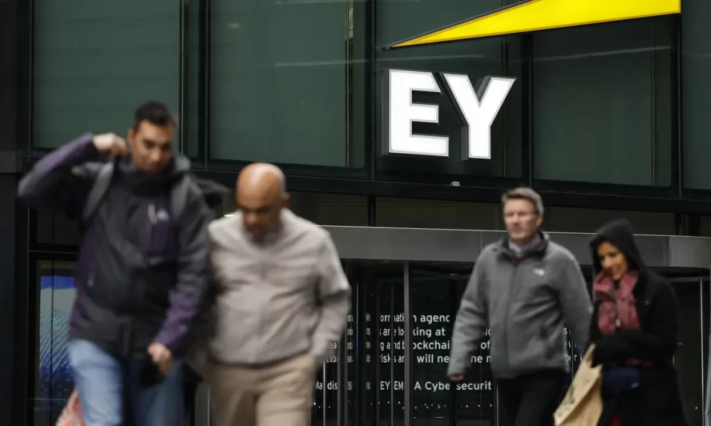 Pedestrians walking outside UK EY office. Photo: Getty Images