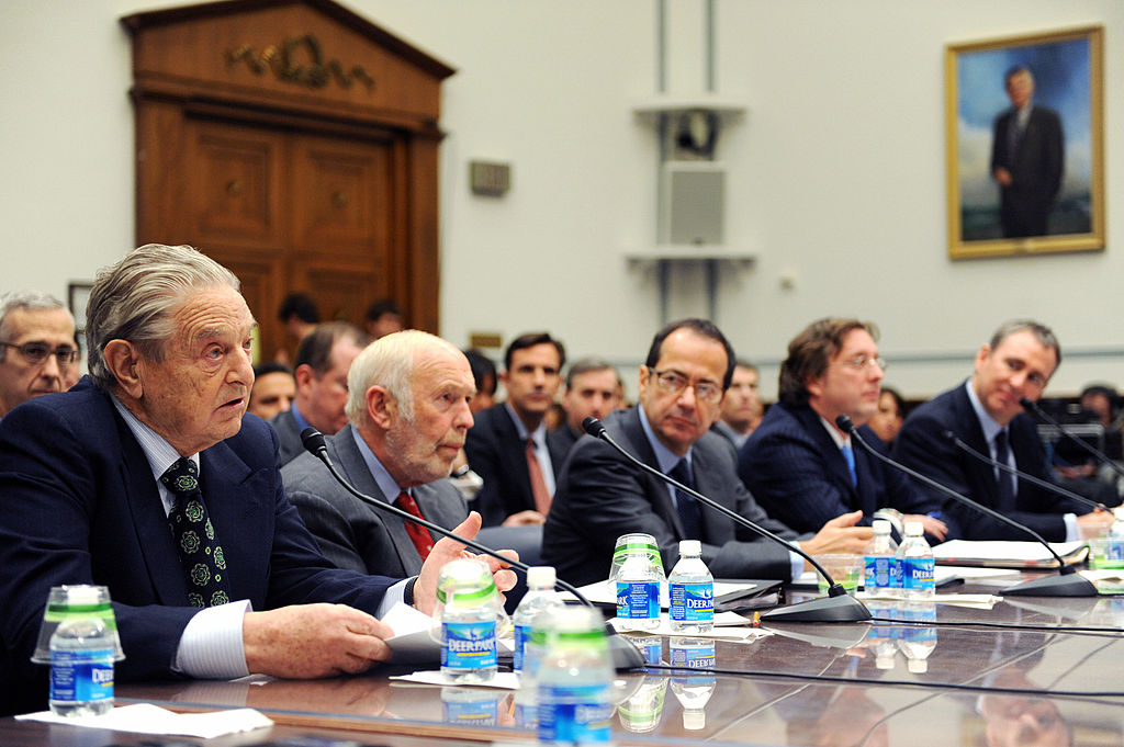 (L to R) George Soros, chairman of Soros Fund Management LLC, James Simons, director of Renaissance Technologies LLC, John Alfred Paulson, president of Paulson & Co., Inc, Philip Falcone, senior managing director of Harbinger Capital Partners, and Kenneth Griffin, CEO and managing director of the Citadel Investment Group attend the House Oversight and Government Reform Committee at a Capitol Hill hearing on the topic of "The Regulation of Hedge Funds" on November 13, 2008 in Washington, DC. Soros testified on the topic of "The Regulation of Hedge Funds" during the hearing. AFP PHOTO/TIM SLOAN (Photo credit should read TIM SLOAN/AFP via Getty Images)