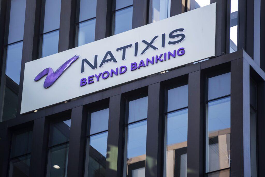 The Natixis SA logo sits on a sign outside the company's headquarters in Paris, France, on Saturday, June 29, 2019. Photo: Getty Images