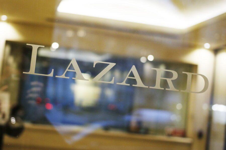 A photo taken on March 10, 2016 in Paris shows on a glass door the logo of  financial advisory and asset management firm Lazard. Photo: MATTHIEU ALEXANDRE/AFP via Getty Images