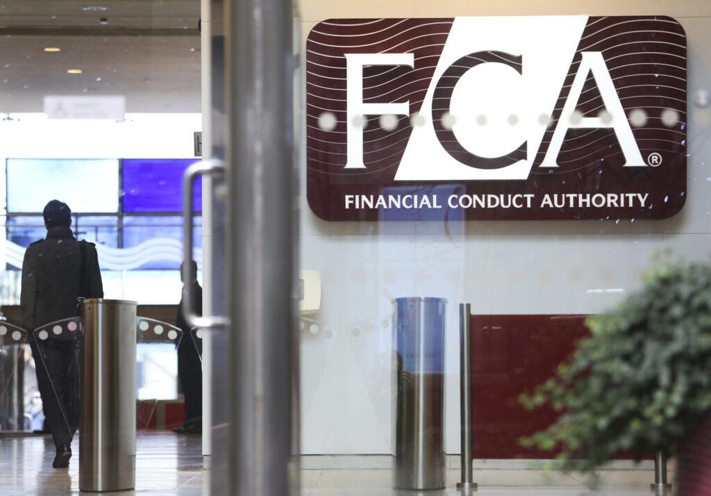 A logo sits on display in the offices of the Financial Conduct Authority (FCA) in the Canary Wharf business district in London, U.K. Odey Asset Management London Office is based in Mayfair. Photo: Getty Images