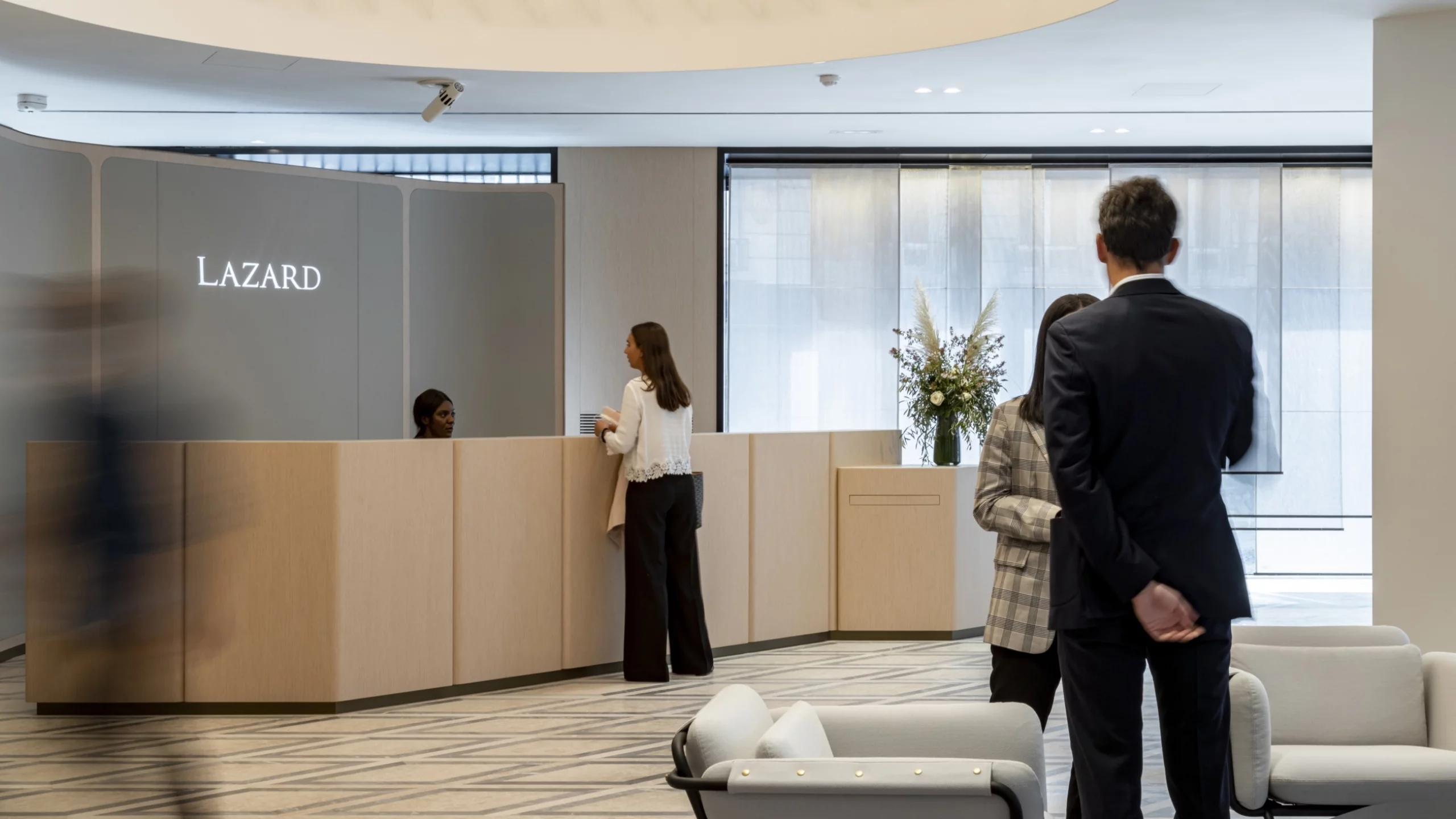 Employees pictured in Lazard reception. PHOTO: Shutterstock